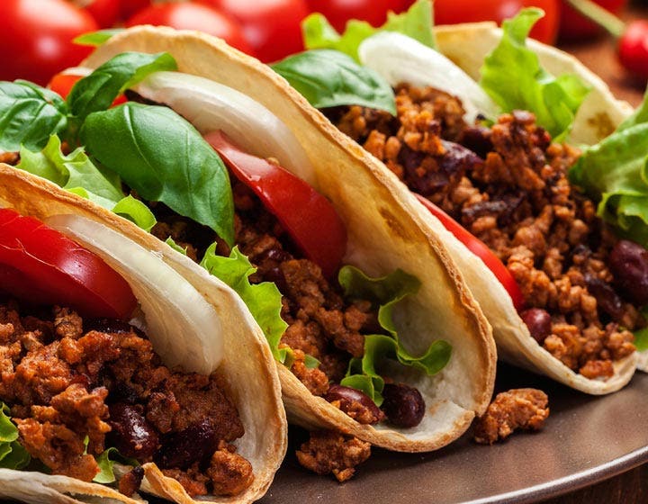 Tacos filled with plant-based ground meat, showcasing alternative protein innovation