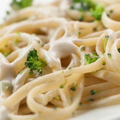 Close-up of pasta in creamy sauce, showcasing savory ingredient innovations